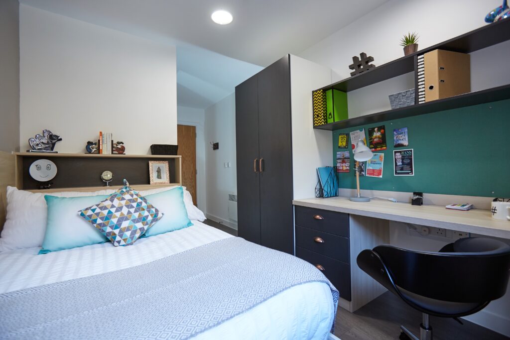 Student accommodation with a bed and desk